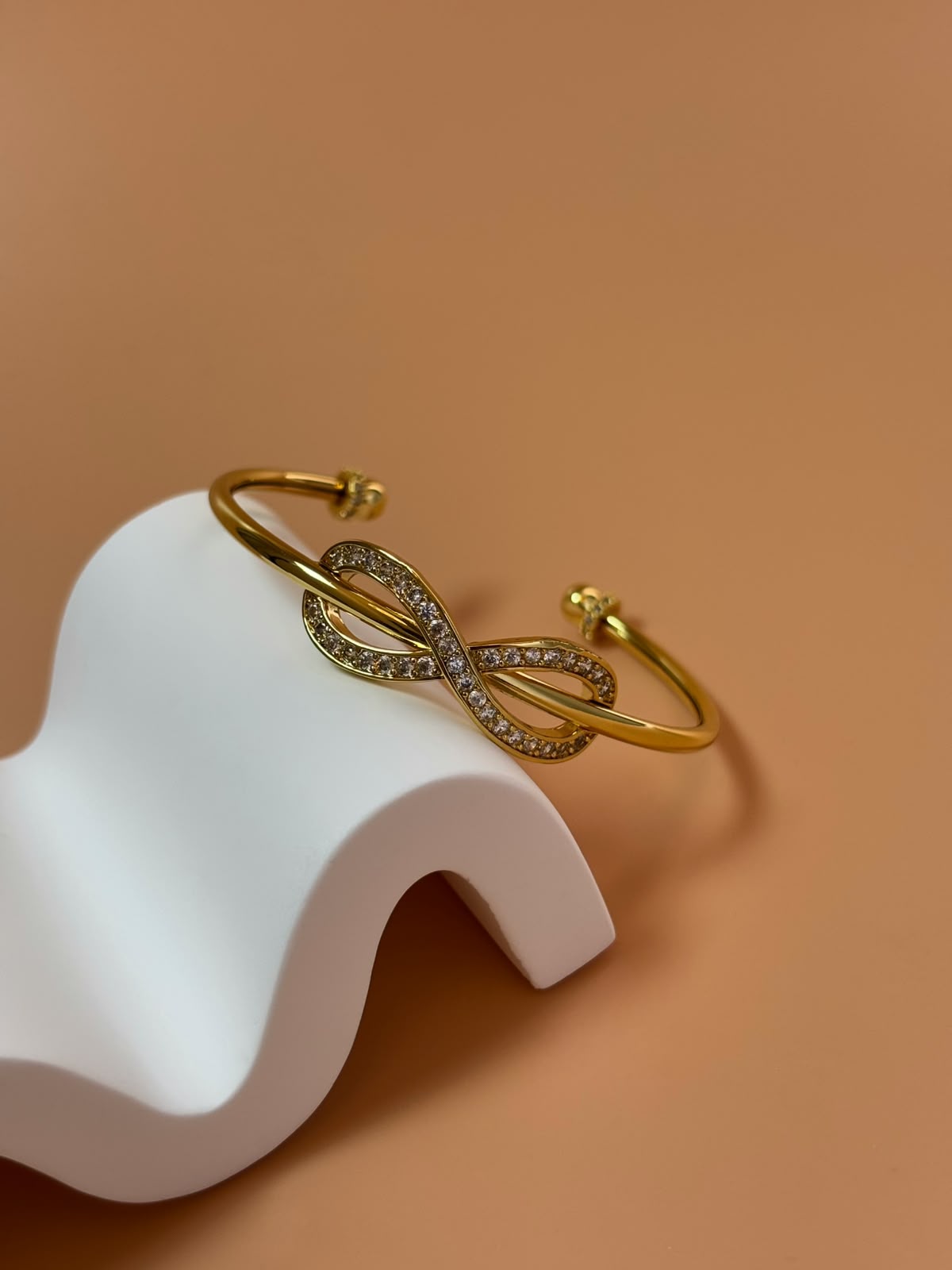 Gold infinity bangle